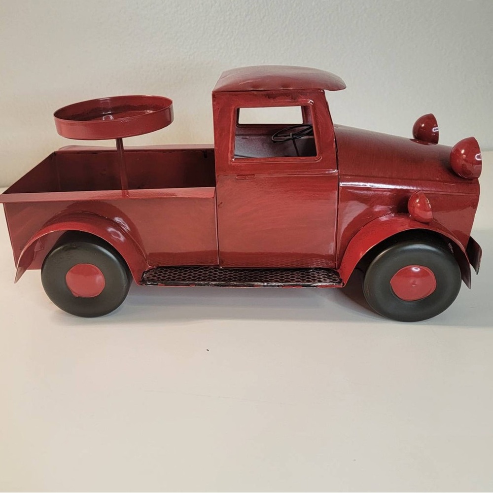 Rustic Red Metal Truck with Candle Holder. Measures 6.5 in W x 12 in L